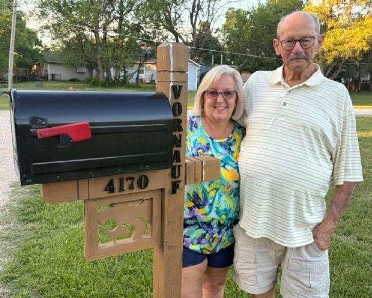 Forrest and Katie V. with his custom made mailbox.